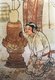 China: A man blowing on the embers in a stove. Detail of a mural in the tomb of Zhang Kuangzheng, Xuanhua, Hebei, Liao Dynasty (1093-1117).
